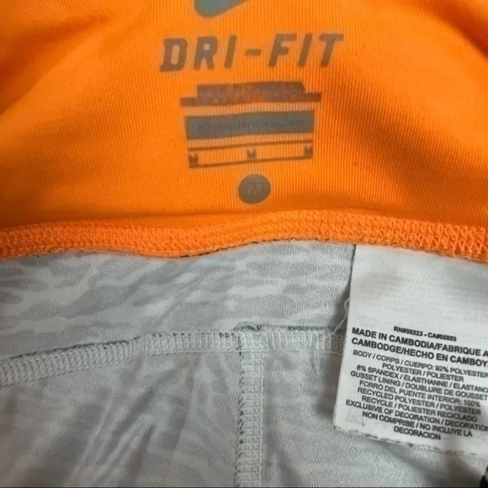Nike Dri-Fit Women Cropped Leggings Medium | Black White Orange